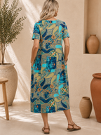 Robe ample, élégante et confortable à col rond avec poches